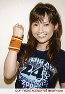 Morning Musume / Natsumi Abe / Upper body / Costume black / Wristband orange / Right hand rock / Background white / Official Official photo