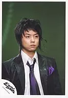 KinKi Kids / Domoto Go / Bust up / Suit black / Tie purple / Shirt white / Background green / Official Official photo