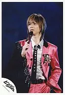 KinKi Kids / Koichi Domoto / Upper body / suit pink / tie black / left hand pocket / right hand microphone / background blue / Official Official photo