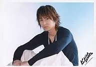 Kinki Kids / Koichi Domoto / Horizontal, Sitting, Left-facing, Costume black, Background light blue / Official Official photo