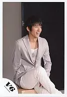 V6 / Ken Miyake / Sitting ・ Jacket Gray ・ Smiling ・ Eye Right ・ Background Black / Official Official photo