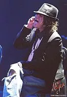 KAT-TUN / Akanishi Jin / Knee-Up / Sitting / Right Hand Cheek / Body Left Facing / Black Costume / Black Hat / You & Jin