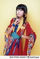 Berryz Kobo / Chinami Tokunaga / Above knee / Background Yellow / Right Hand Forefinger / Cheek / Left Hand / Hip / Costume Red and Blue / Green Belt / Official Official photo