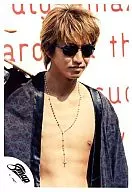 SMAP / Takuya Kimura / Upper body / Naked / Jacket black / Sunglasses / Wall with English background / Official Official photo