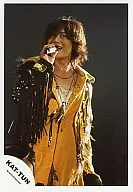 KAT TUN / Hitoshi Akanishi / Live Photo / Upper Body / Costume Yellow / Right Hand Microphone / Background Black / Official Official photo