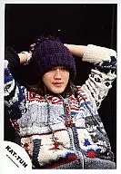 KAT TUN / Akanishi Jin / Upper Body / Mixed Red / White / Blue Sweater / Purple Knitted hat / Both Hands Head / Under Eyes / Black Background / Official Official photo