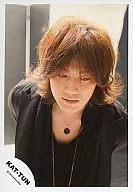 KAT TUN / Akanishi Jin / Bust up / Jacket black / Necklace / Under eyes / Background black and white / Official Official photo