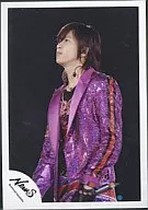 NEWS / Tomohisa Yamashita / Live Photo / Upper Body / Costume Purple / Body Facing Left / Left Hand Microphone / Background Black / Official Official photo