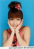 Nozomi Tsuji / Pink Costume / Both Hands Face / Blue Background / Official Official photo