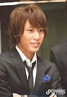 Akihiro Yasuda / Bust up / Costume black / white / Suit / Tie / Arm combination / Eye-line right / Smile / 8 UPPERS LIVE TOUR