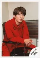 Johnny's West / Takahiro Hamada / Above-the-knee / Costume red / Sitting / Facing right / Both hands / "Start Dash / Akatsuki" MV & Jacque Shooting Off-Shot / Official Official photo