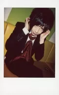 The Raid. / Tenshi / Knee-Up / Sitting / Costume Black / White / Red / Ears with both hands / Chin pulled / Facing right / Raw Cheki