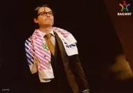 Tatsuya Isaka (Michihisa Kurobe) / Live photo, horizontal, upper body, towel around neck, both hands hanging, black background / Stage "Rail Way" random bromide event ver.