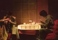 Noriyoshi Tsumura, 雅成 Wada / Live Photo, Horizontal, Whole Body (Tarumi Cut), Costume Grey, Green, Sitting, Wada Left Facing, Right Hand Spoon, Face Down / Stage picture of "Gakyojin Hokusai"