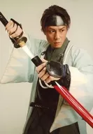 Masakatsu Nemoto (Hijikata Toshizo) / Upper Body / Costume Light Blue / Black / Both Hands Sword / Eye View Right / Background White / Stage "BARAGA - Oniki"