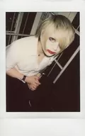 Axkey/AST / Knee-Up / Sitting / Costume White Shirt / Black / Both Hands Layered / Facing Right / Mouth Closed / Raw Cheki