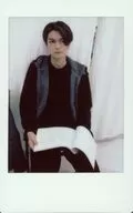 Tatsutaka Mizuta / Knee-high ・ Costume black ・ Vest ・ Chair seated ・ Knee-high script ・ Eye line right ・ Mouth closed ・ Back curtain white / Fresh Cheki
