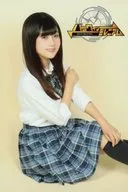 Yui Miyazaki (Kurumi Misaka) / Above-the-knee, sitting, costume white, blue, right and left arm, left knee, body facing right, yellow background, postcard size / Stage "Back In Millennium" photo by Toru Character