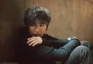 Ahn Jae-wook / Horizontal, Upper Body, Black Costume, Sitting, Body Facing Right, Left Hand Shoulders, Eyes Left / CD "at this moment/Re : package" Special Official photo